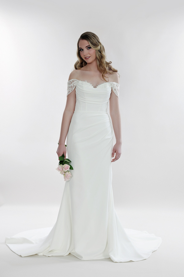 Fitted off-the-shoulder wedding dress.