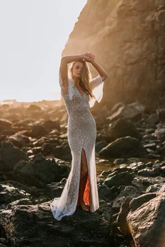 Beaded wedding dress for a coastal beach setting.